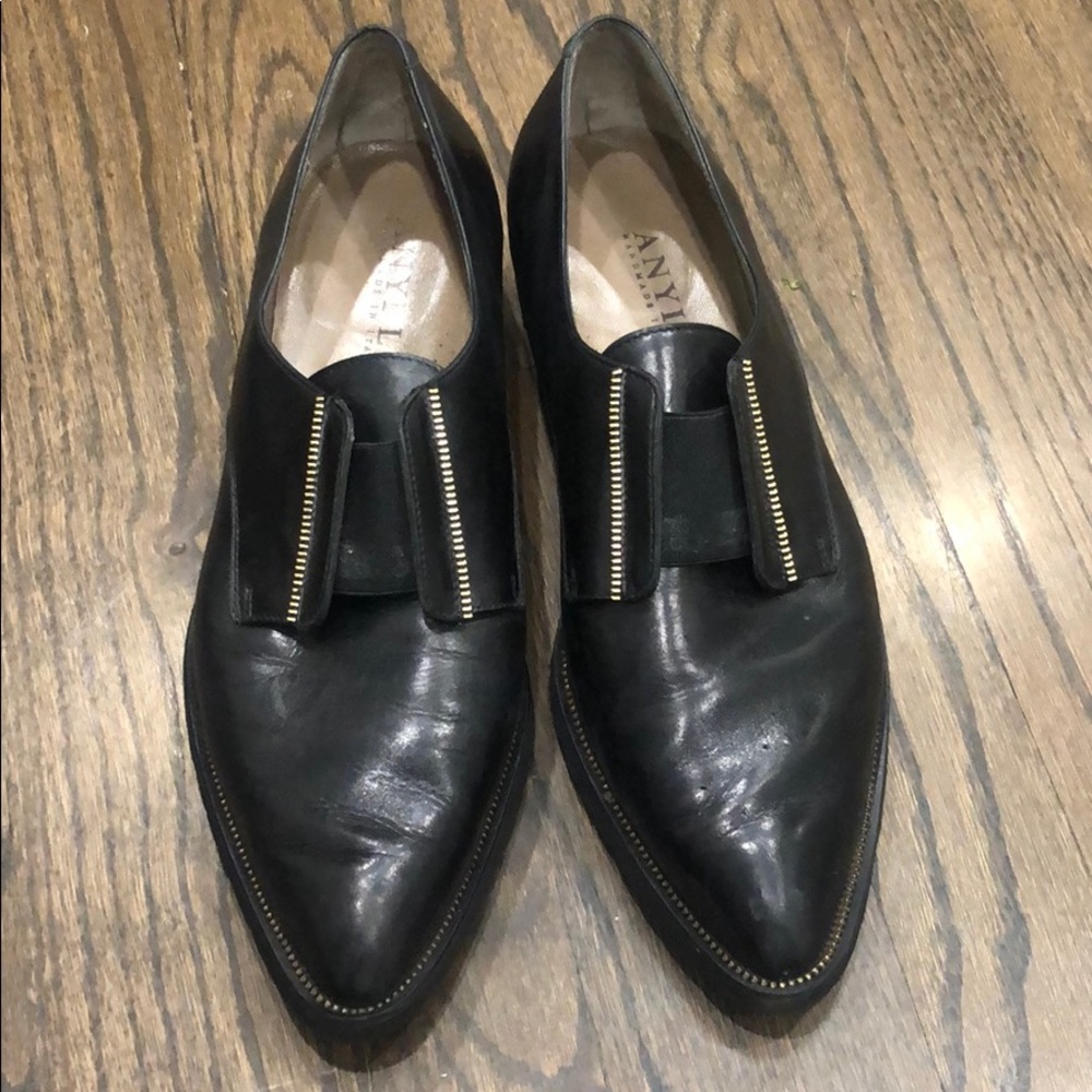 Black and gold pointed toe oxfords